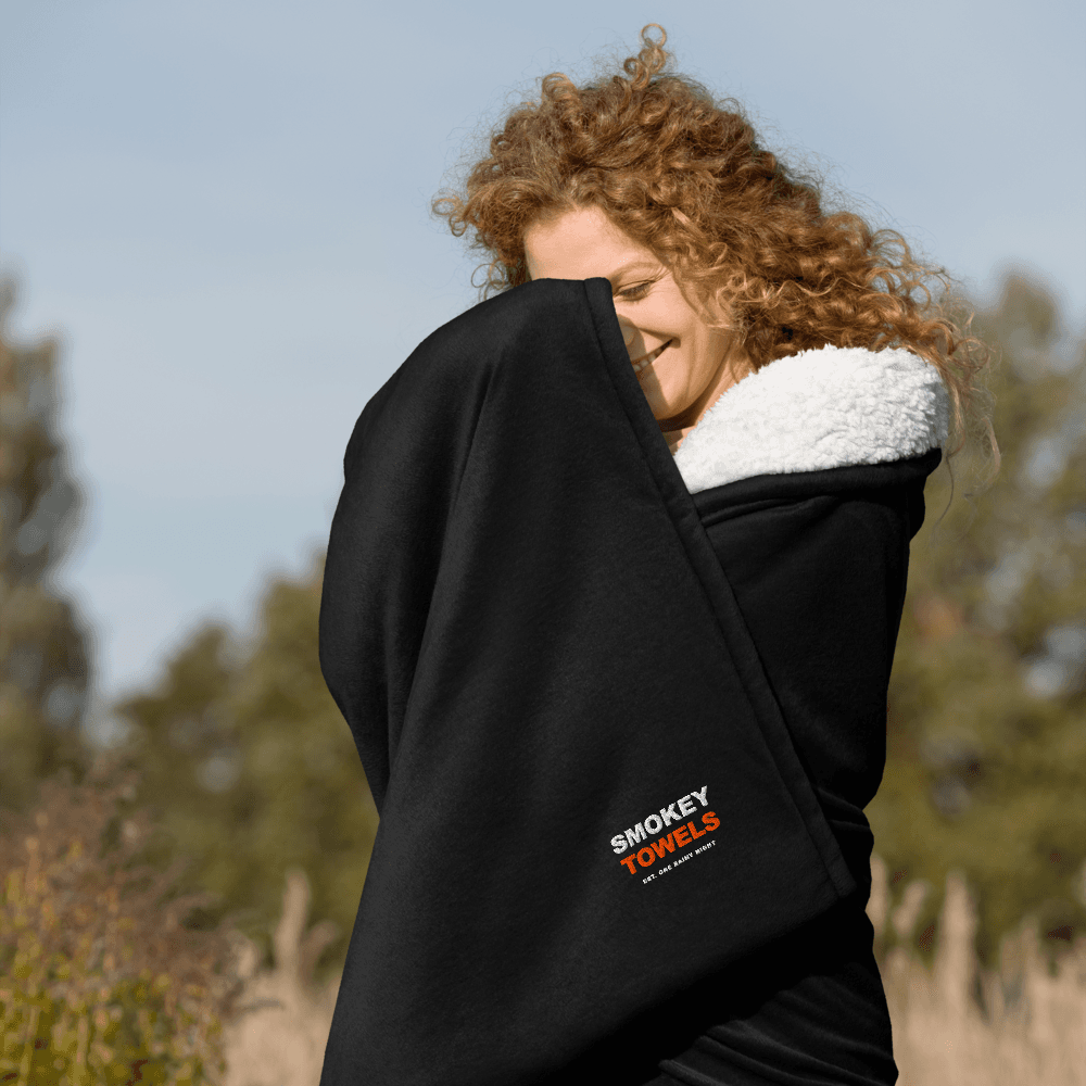 Smokey Towels Sherpa Blanket in Black — lifestyle / front